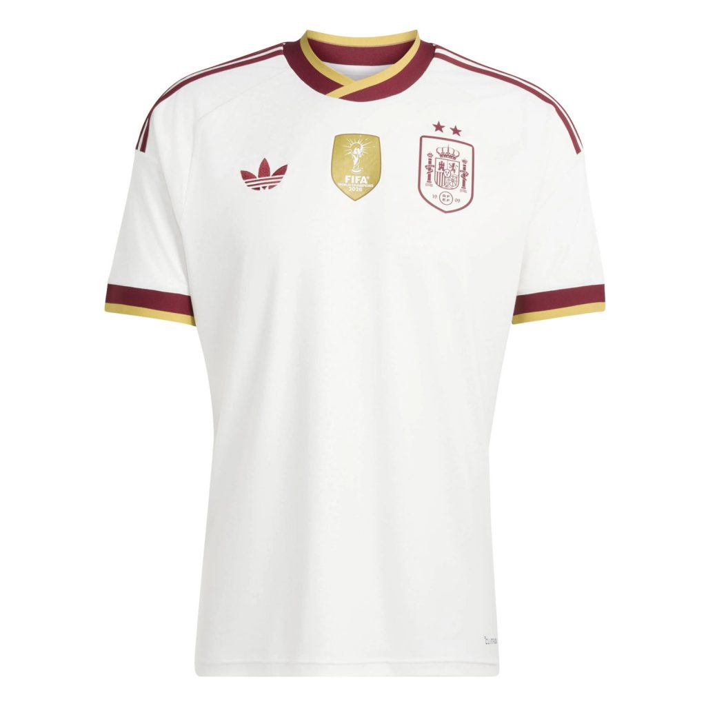 Maillot Espagne extérieur Winners 2026 adidas, blanc cassé avec écusson bordeaux, deux étoiles et badge doré de champion du monde